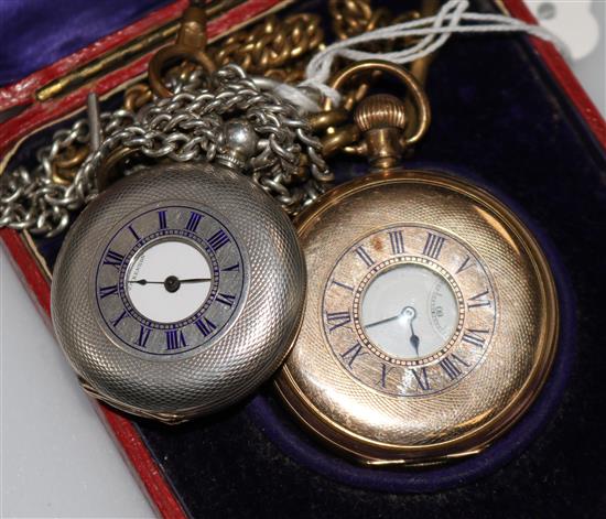 A gold plated half hunter pocket watch and a silver half hunter pocket watch,